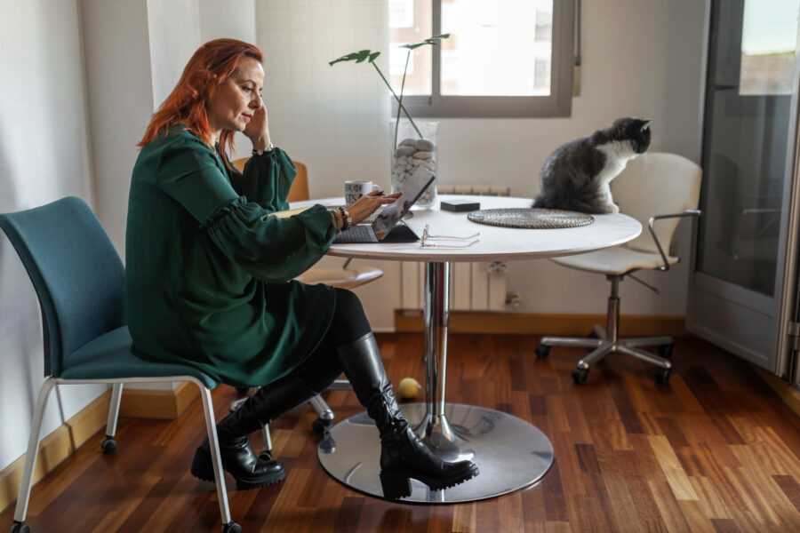 Woman working at home on drip marketing campaign